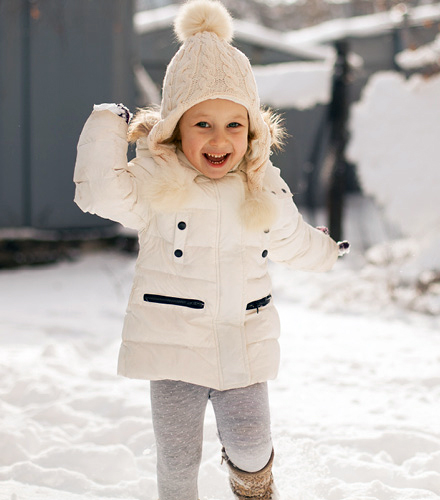 Children's Orchard little girl wearing white winter coat and knitted ...