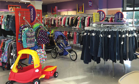 Children's Orchard Murfreesboro store before grand opening, stocked with toys and racks of clothes and kids jeans, neat and organized floor plan