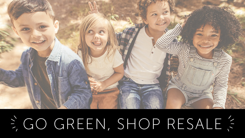 Go green, shop resale. Group of four kids sitting outside in the summer.